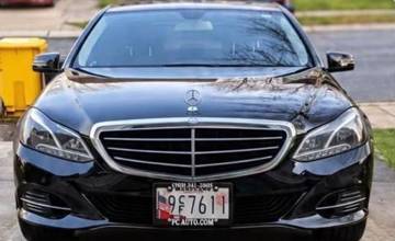 Front of the black Mercedes-Benz sedan, plate 9F7611 (Maryland)